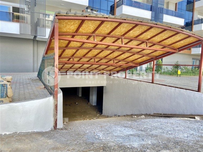 Новая квартира с качественной чистовой отделкой в полутора километрах от моря, в современном районе Аланьи - Верхняя Оба-id-7160-фото-17