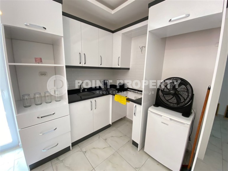 Светлая уютная квартира 1+1, общей площадью 60 м2, в центре популярного района Аланьи - Махмутлар-id-7162-фото-3