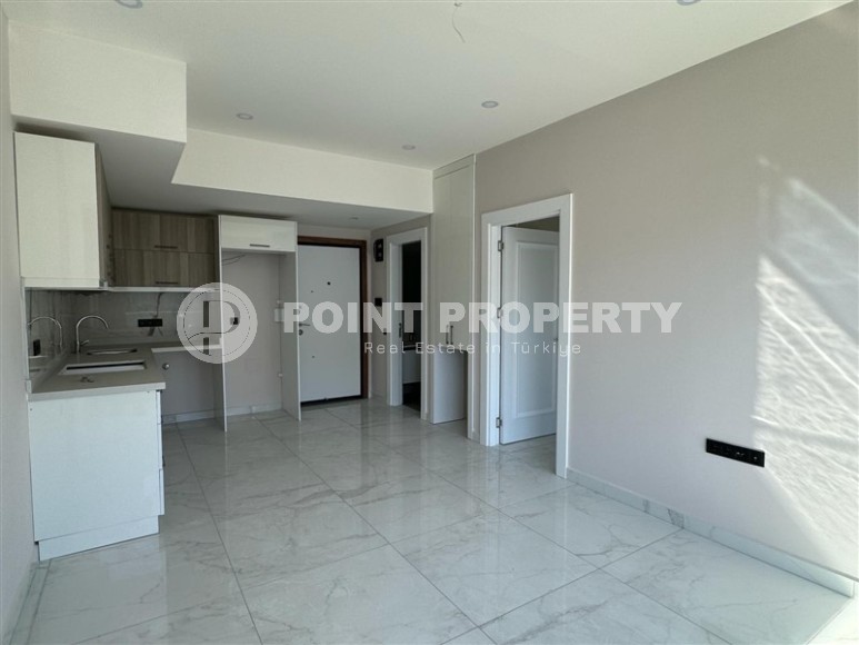 Новая квартира 1+1 с качественной чистовой отделкой, в 450 метрах от знаменитого пляжа Клеопатры-id-7163-фото-2