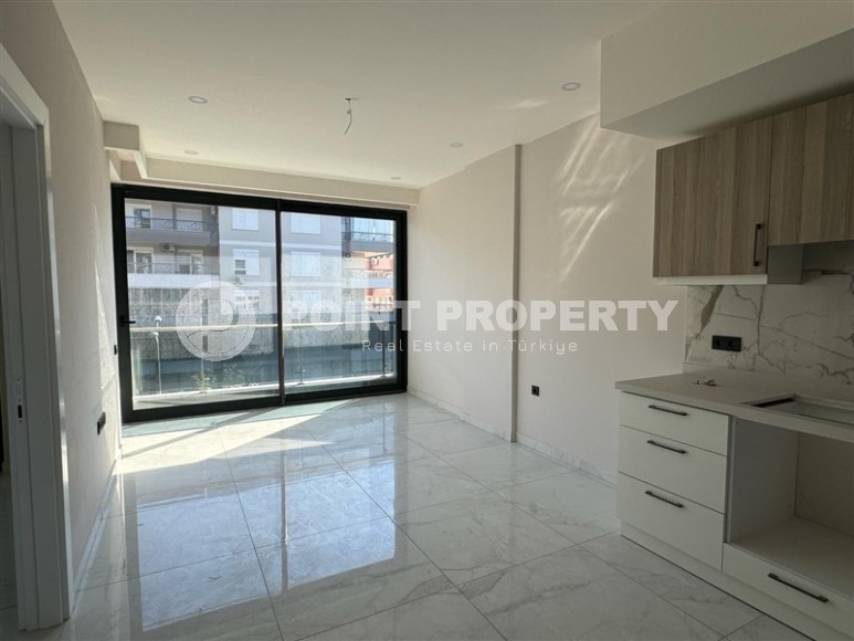 Новая квартира 1+1 с качественной чистовой отделкой, в 450 метрах от знаменитого пляжа Клеопатры-id-7163-фото-3