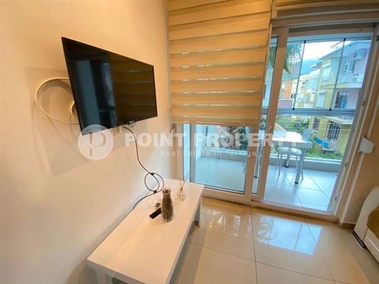 Компактная квартира 1+1, общей площадью 50 м2, в современном жилом комплексе в центре Аланьи-id-7173-фото-2