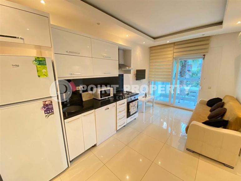 Компактная квартира 1+1, общей площадью 50 м2, в современном жилом комплексе в центре Аланьи-id-7173-фото-3