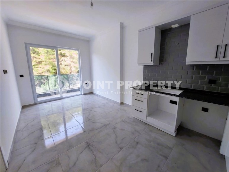 Apartment 1+1 with high-quality finishing on the 4th floor in a residential complex, commissioned in 2023-id-7180-photo-3