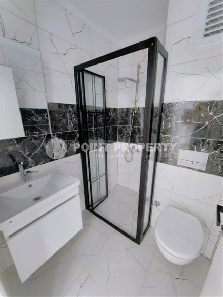 Apartment 1+1 with high-quality finishing on the 4th floor in a residential complex, commissioned in 2023-id-7180-photo-8