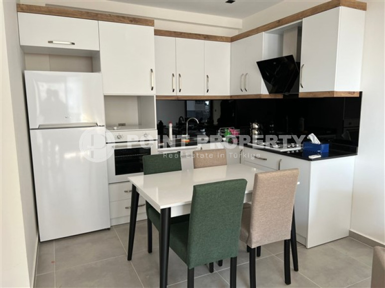 Furnished apartment 1+1, 70m², in a complex with hotel infrastructure in Mahmutlar, Alanya.-id-1559-photo-2