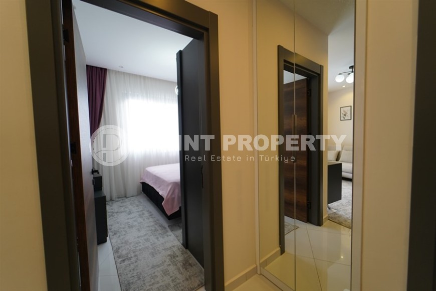 Compact 1+1 apartment with views of the city and the Taurus Mountains, on the 10th floor, 550 meters from the sea-id-7186-photo-8