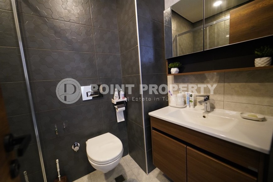 Compact 1+1 apartment with views of the city and the Taurus Mountains, on the 10th floor, 550 meters from the sea-id-7186-photo-9