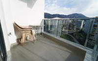 Compact 1+1 apartment with views of the city and the Taurus Mountains, on the 10th floor, 550 meters from the sea-id-7186-photo-10