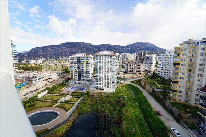 Compact 1+1 apartment with views of the city and the Taurus Mountains, on the 10th floor, 550 meters from the sea-id-7186-photo-11