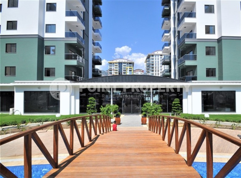 Compact 1+1 apartment with views of the city and the Taurus Mountains, on the 10th floor, 550 meters from the sea-id-7186-photo-19