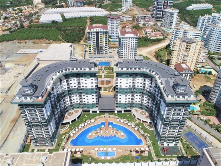 Compact 1+1 apartment with views of the city and the Taurus Mountains, on the 10th floor, 550 meters from the sea-id-7186-photo-23