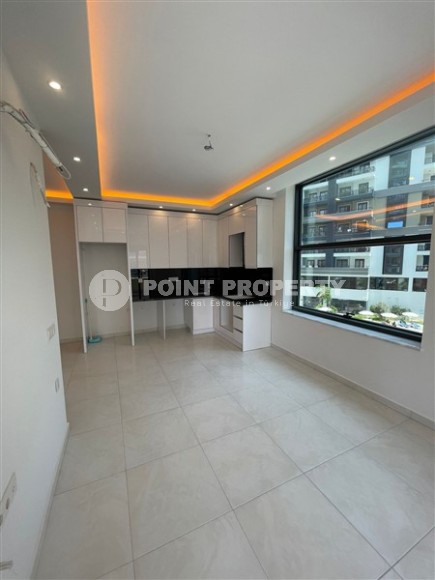 Apartment with high-quality finishing 650 meters from the sea, in the center of the modern area of Alanya - Mahmutlar-id-7189-photo-2