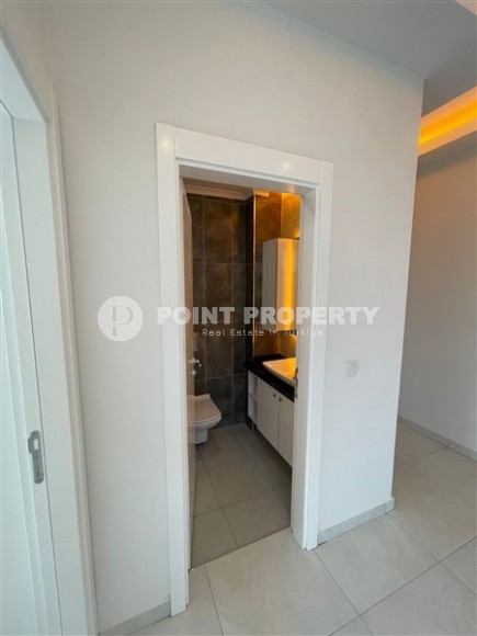 Apartment with high-quality finishing 650 meters from the sea, in the center of the modern area of Alanya - Mahmutlar-id-7189-photo-5