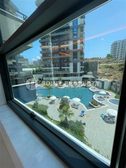 Apartment with high-quality finishing 650 meters from the sea, in the center of the modern area of Alanya - Mahmutlar-id-7189-photo-7