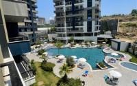 Apartment with high-quality finishing 650 meters from the sea, in the center of the modern area of Alanya - Mahmutlar-id-7189-photo-8