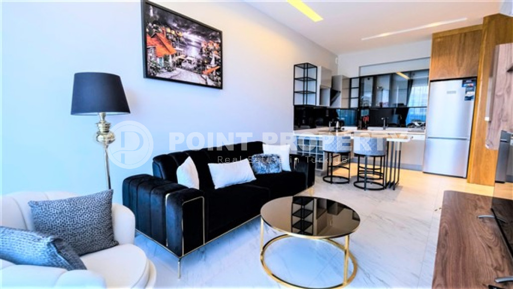 Уютная двухкомнатная квартира, 62м², на первой береговой линии в Каргыджаке, Алания.-id-1560-фото-2