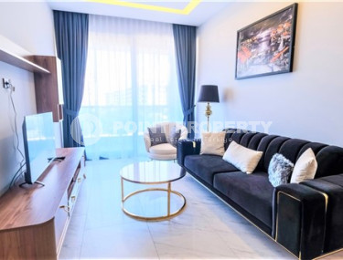 Уютная двухкомнатная квартира, 62м², на первой береговой линии в Каргыджаке, Алания.-id-1560-фото-3