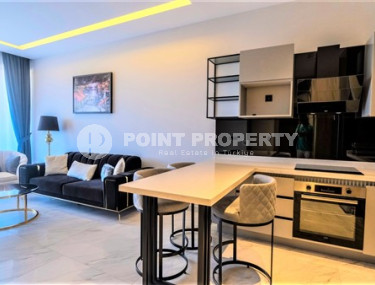 Уютная двухкомнатная квартира, 62м², на первой береговой линии в Каргыджаке, Алания.-id-1560-фото-4