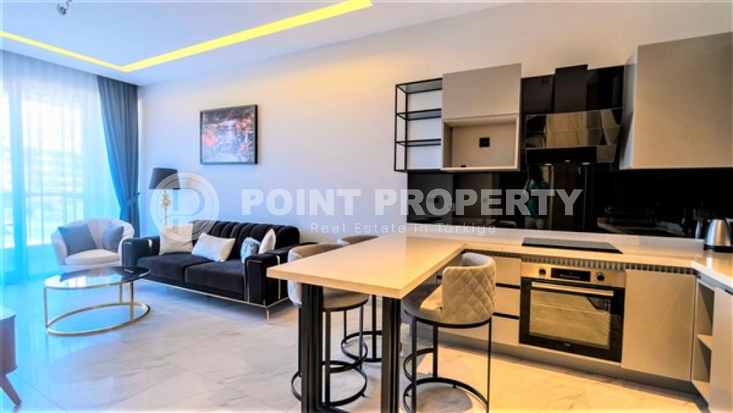 Уютная двухкомнатная квартира, 62м², на первой береговой линии в Каргыджаке, Алания.-id-1560-фото-4