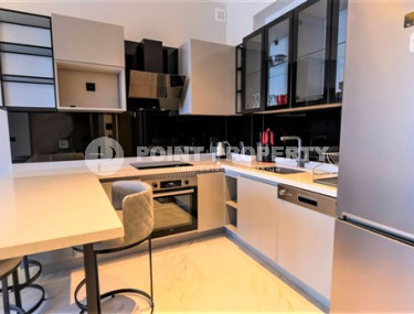 Уютная двухкомнатная квартира, 62м², на первой береговой линии в Каргыджаке, Алания.-id-1560-фото-5