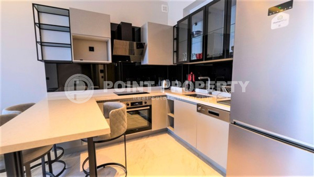 Уютная двухкомнатная квартира, 62м², на первой береговой линии в Каргыджаке, Алания.-id-1560-фото-5