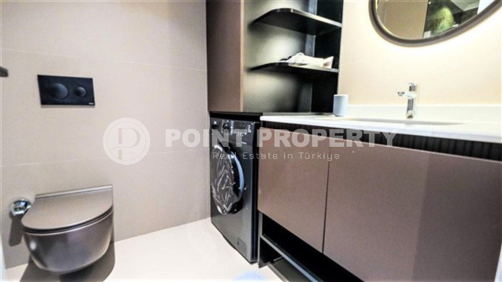 Уютная двухкомнатная квартира, 62м², на первой береговой линии в Каргыджаке, Алания.-id-1560-фото-8