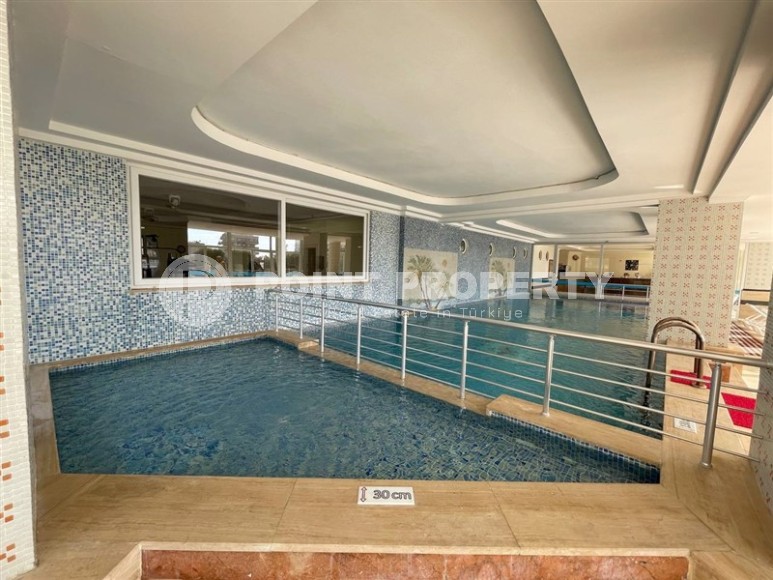 Comfortable apartment with furniture and household appliances 700 meters from the sea, in the center of the popular area of Alanya - Mahmutlar-id-7197-photo-18