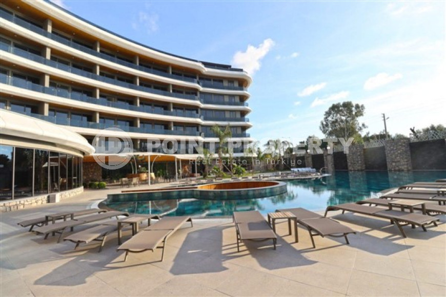 Уютная двухкомнатная квартира, 62м², на первой береговой линии в Каргыджаке, Алания.-id-1560-фото-18