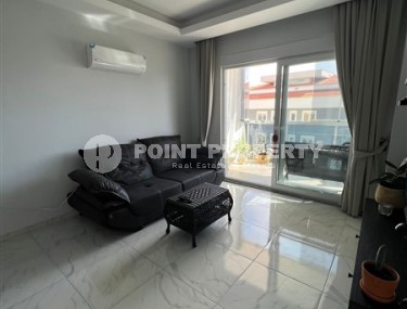 Compact 1+1 apartment with a spacious glazed balcony, in a prestigious area of Alanya - Upper Oba-id-7201-photo-1
