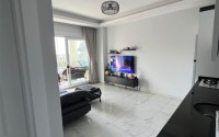 Compact 1+1 apartment with a spacious glazed balcony, in a prestigious area of Alanya - Upper Oba-id-7201-photo-2