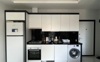 Компактная квартира 1+1 с просторным застекленным балконом, в престижном районе Аланьи - Верхняя Оба-id-7201-фото-3