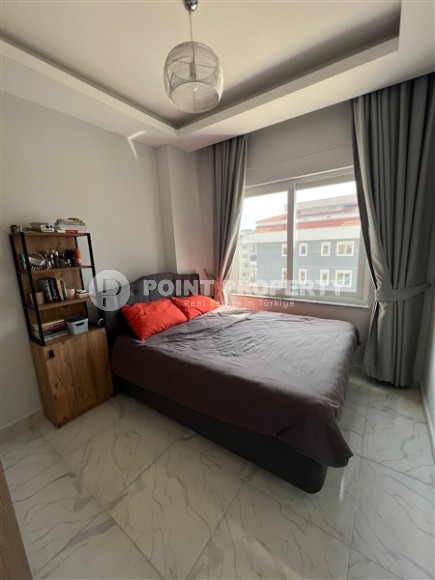 Compact 1+1 apartment with a spacious glazed balcony, in a prestigious area of Alanya - Upper Oba-id-7201-photo-4