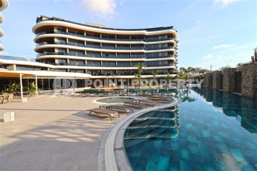 Уютная двухкомнатная квартира, 62м², на первой береговой линии в Каргыджаке, Алания.-id-1560-фото-20