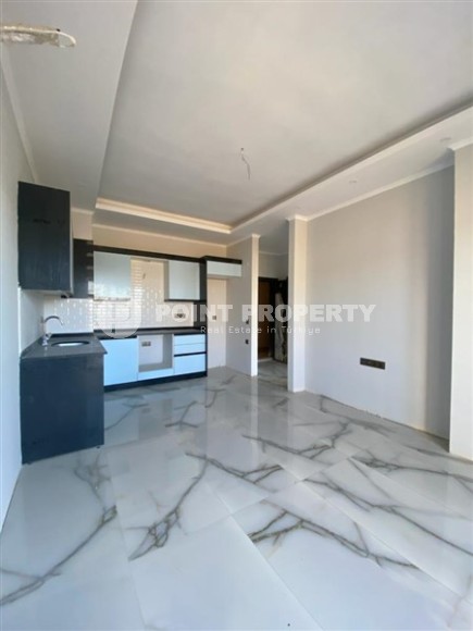 Новая квартира с качественной чистовой отделкой в двух километрах от моря, в живописном районе Аланьи - Паяллар-id-7203-фото-2