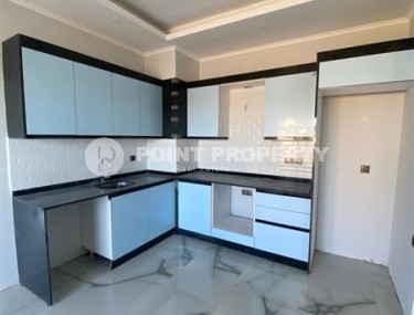 Новая квартира с качественной чистовой отделкой в двух километрах от моря, в живописном районе Аланьи - Паяллар-id-7203-фото-3