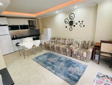 Comfortable furnished 1+1 apartment 300 meters from the sea, in the center of Mahmutlar-id-7209-photo-3