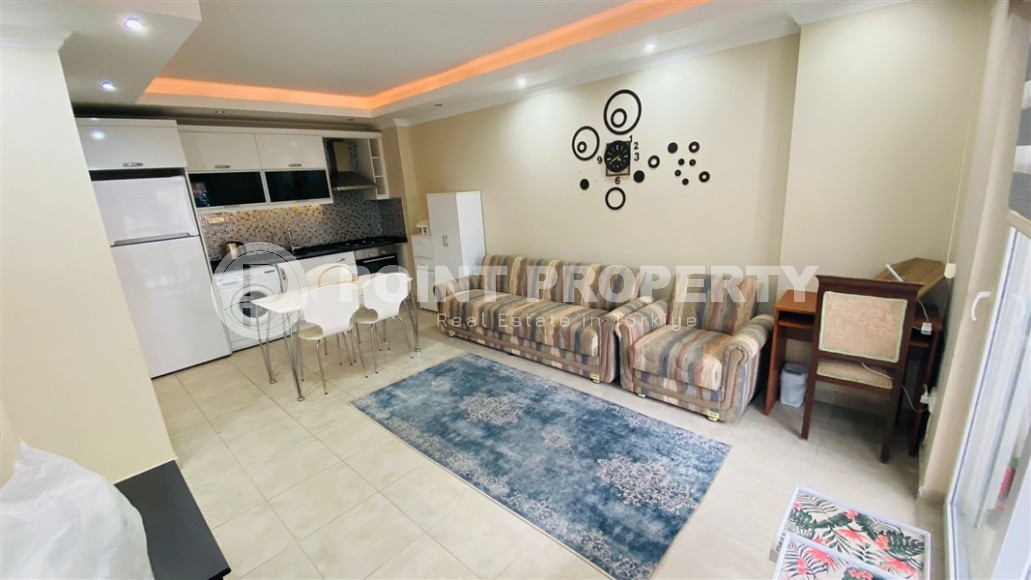 Comfortable furnished 1+1 apartment 300 meters from the sea, in the center of Mahmutlar-id-7209-photo-3