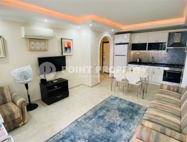 Comfortable furnished 1+1 apartment 300 meters from the sea, in the center of Mahmutlar-id-7209-photo-4