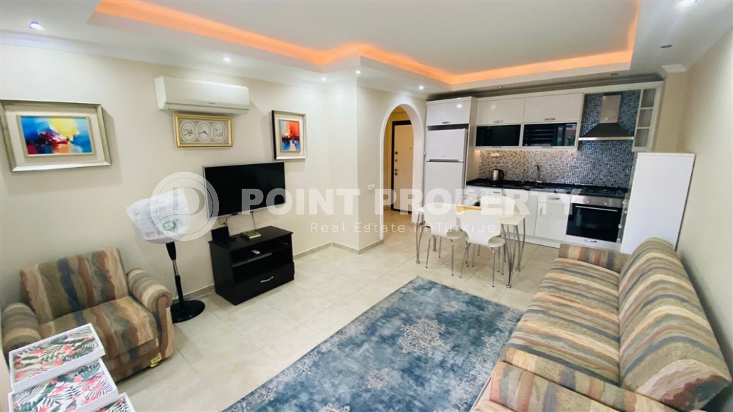 Comfortable furnished 1+1 apartment 300 meters from the sea, in the center of Mahmutlar-id-7209-photo-4