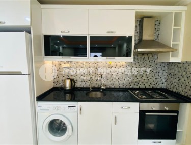 Comfortable furnished 1+1 apartment 300 meters from the sea, in the center of Mahmutlar-id-7209-photo-5