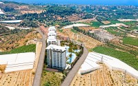 Квартира в ультрасовременном жилом комплексе на завершающем этапе строительства, в популярном районе Аланьи - Махмутлар-id-7213-фото-22