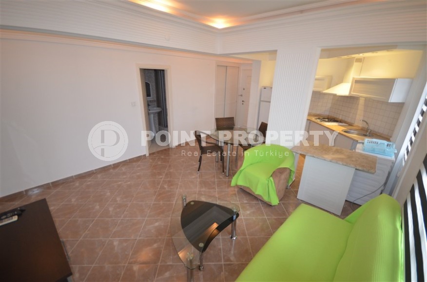 Благоустроенная меблированная квартира 1+1, общей площадью 55 м2, в центре современного района Аланьи - Нижняя Оба-id-7216-фото-2