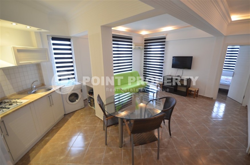 Благоустроенная меблированная квартира 1+1, общей площадью 55 м2, в центре современного района Аланьи - Нижняя Оба-id-7216-фото-3