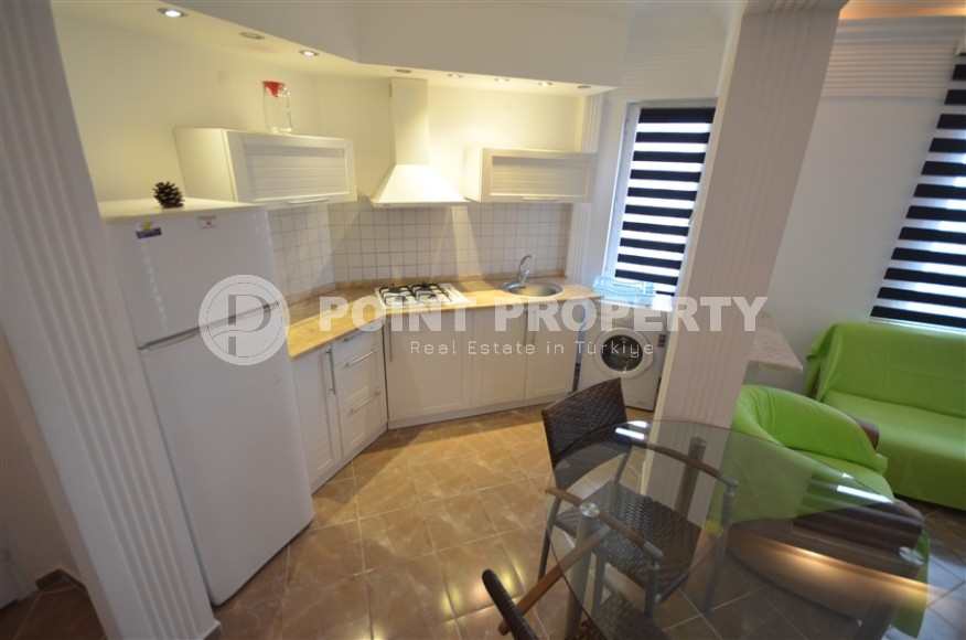 Благоустроенная меблированная квартира 1+1, общей площадью 55 м2, в центре современного района Аланьи - Нижняя Оба-id-7216-фото-4