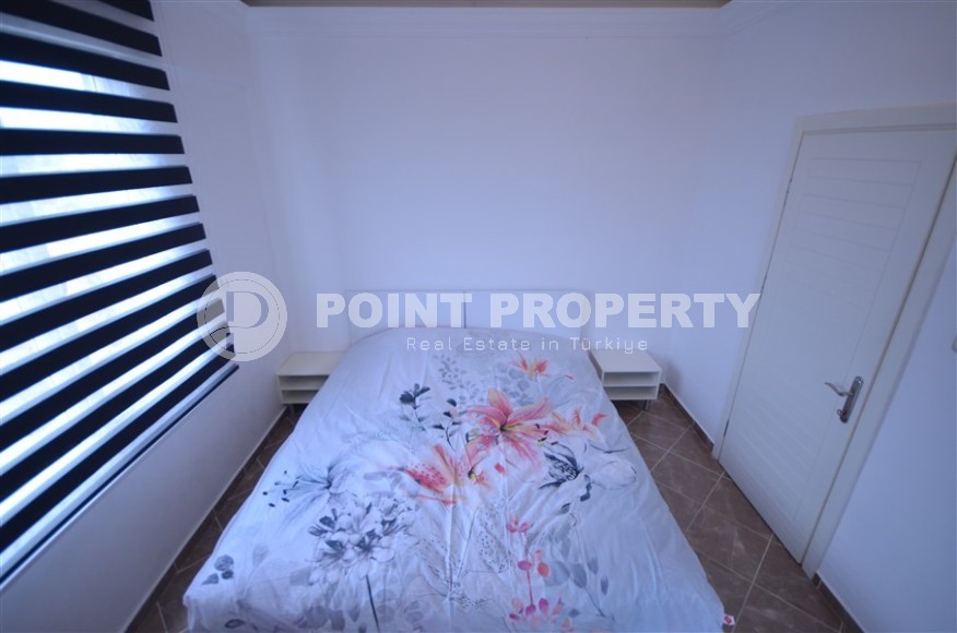 Благоустроенная меблированная квартира 1+1, общей площадью 55 м2, в центре современного района Аланьи - Нижняя Оба-id-7216-фото-6