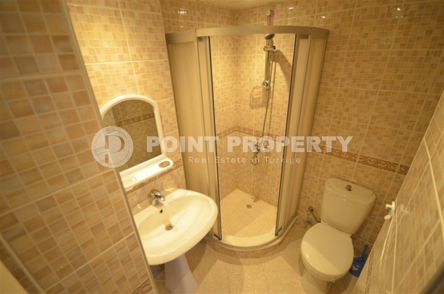 Благоустроенная меблированная квартира 1+1, общей площадью 55 м2, в центре современного района Аланьи - Нижняя Оба-id-7216-фото-8