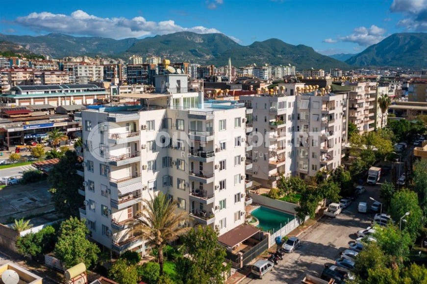 Благоустроенная меблированная квартира 1+1, общей площадью 55 м2, в центре современного района Аланьи - Нижняя Оба-id-7216-фото-15