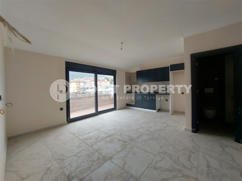 Современный трёхкомнатный пентхаус 109 м2 в резиденции на стадии строительных работ, центр Аланьи, Кейкубат-id-4017-фото-6