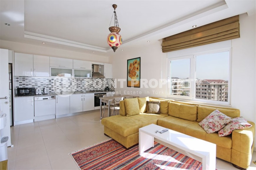 Ready-to-move-in apartment with furniture and household appliances, 600 meters from the sea, in a quiet area of Alanya - Avsallar-id-7219-photo-2