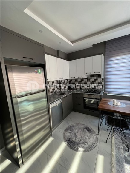 Доступная по цене квартира с современным дизайном, мебелью и бытовой техникой, в двух километрах от моря-id-7229-фото-3